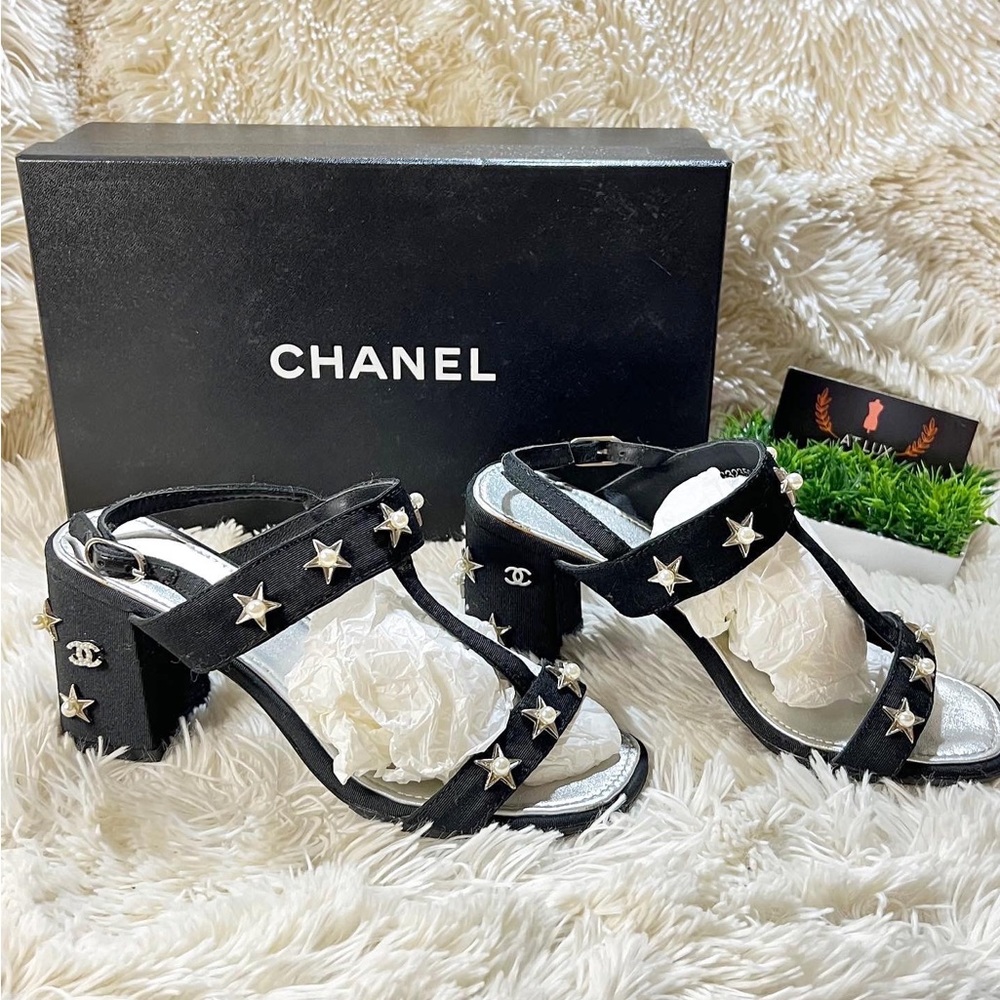 SOLD Authentic CHANEL Sandals Stars Pearls T-Strap Block Heels in black.